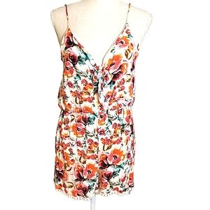 ROYAL T | Women's white with floral print crepe-texture romper. Size large.